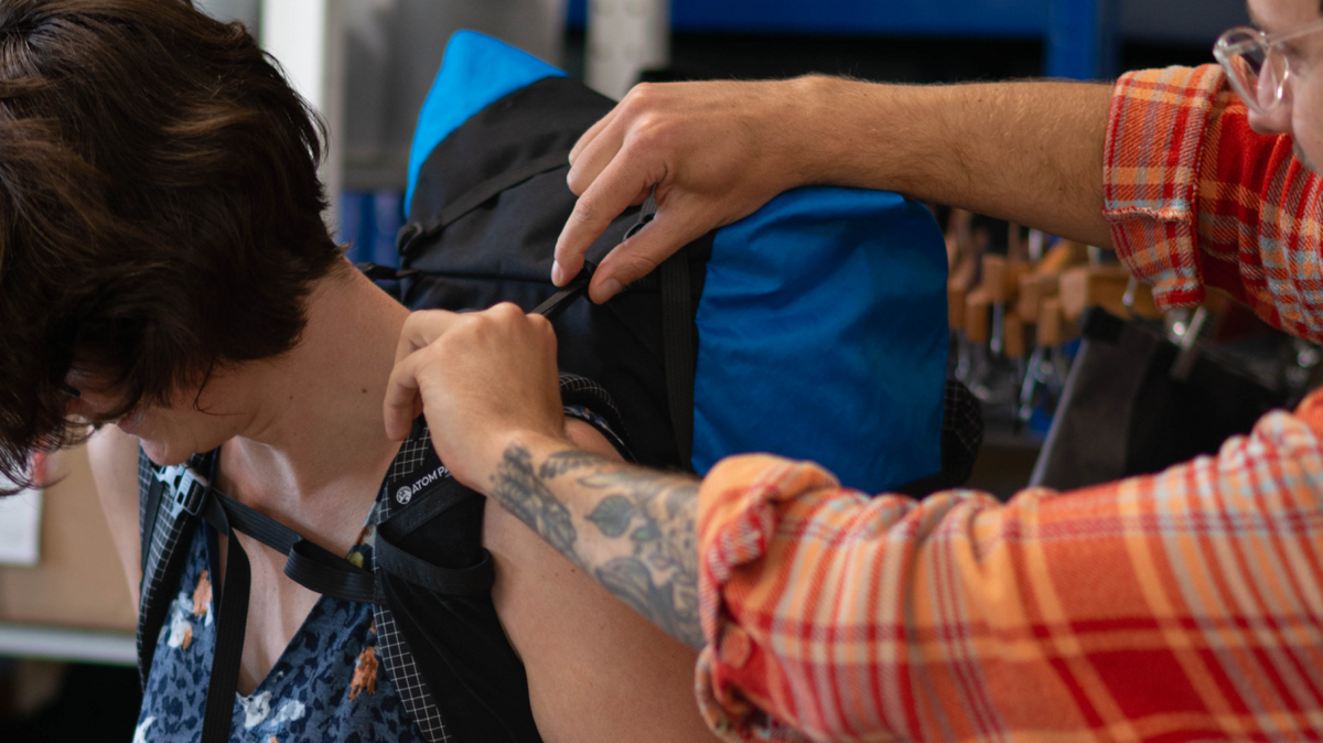 How to put on a backpack